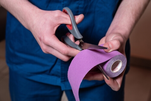 verzwikte enkel tapen